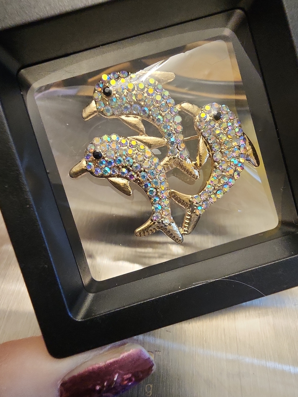 Gold-tone Triple Dolphin Rhinestone Brooch - Iridescent Crystal